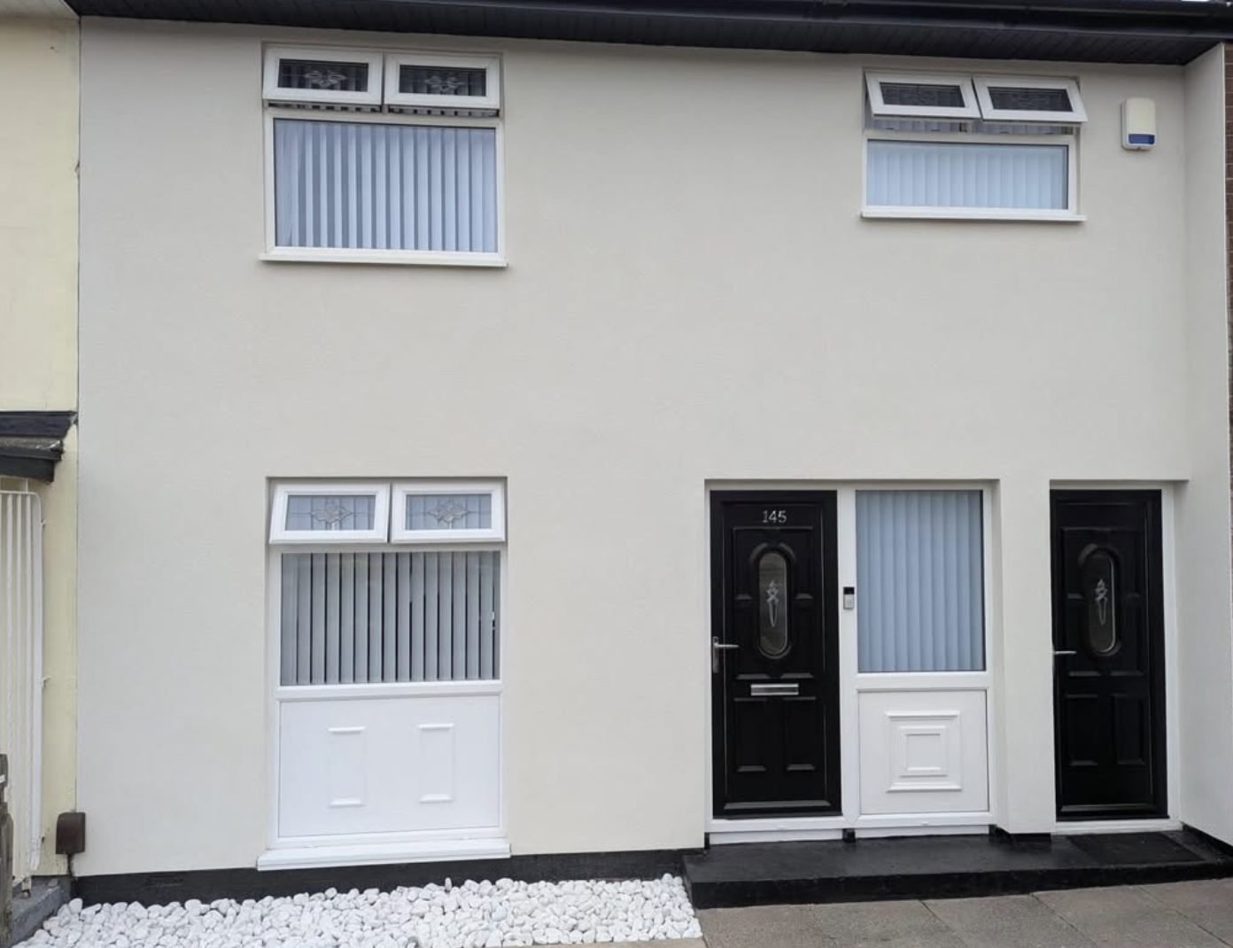 Two terraced fronts in smooth cream render
